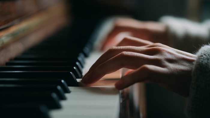 Student practicing proper hand technique on their home piano in East Cobb during a lesson with Davide Palmer